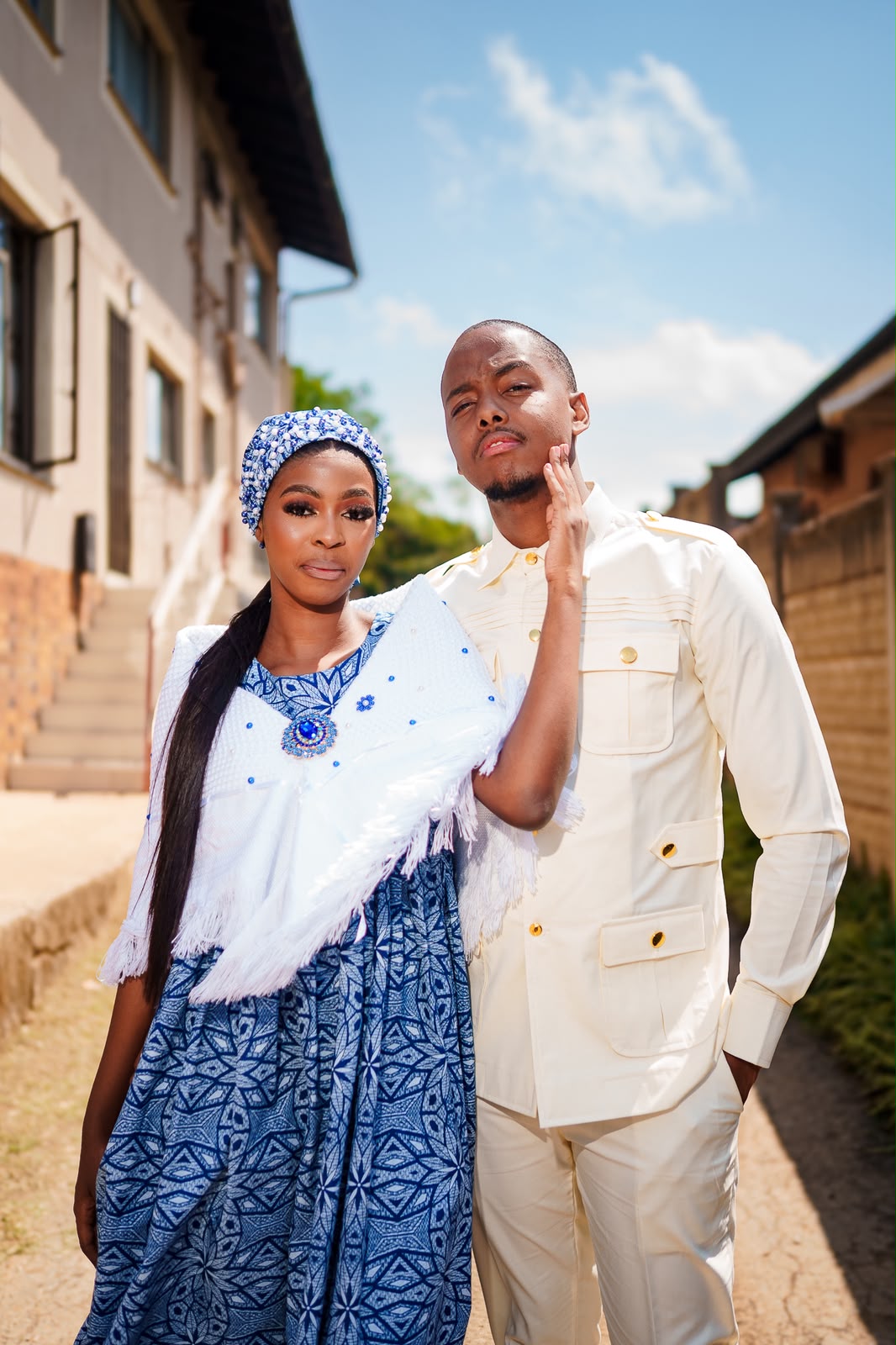 Lindokuhle and Anele posing together in cream and blue